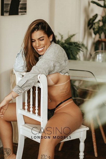 playful London escorts busty party girl JULIA